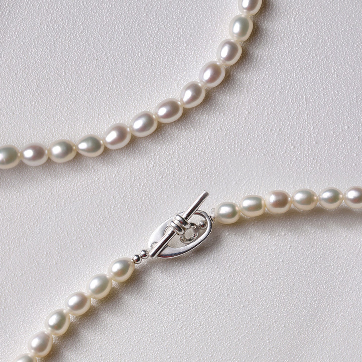 XL003 - Kisspearl Jewelry 4-5mm Rice Pearl Necklace