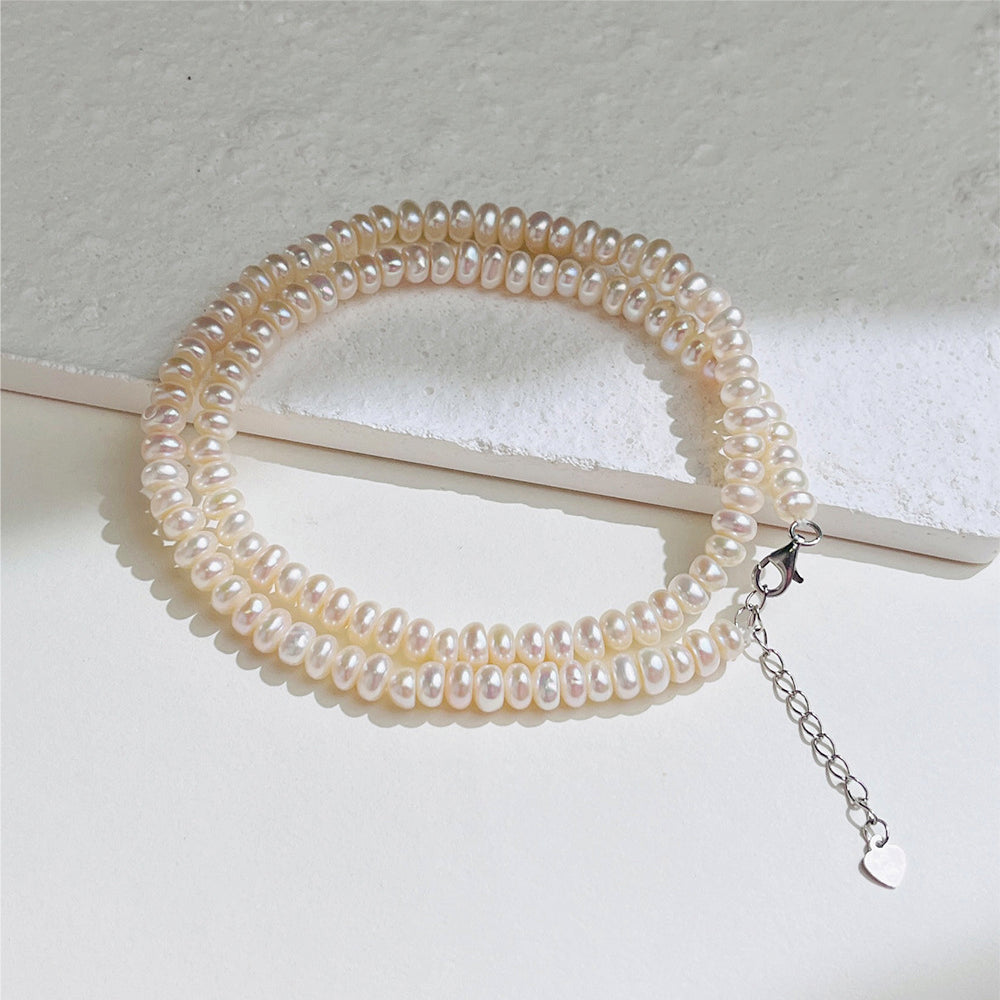 XL001 - Kisspearl Jewelry 4-5mm Button Pearl Necklace