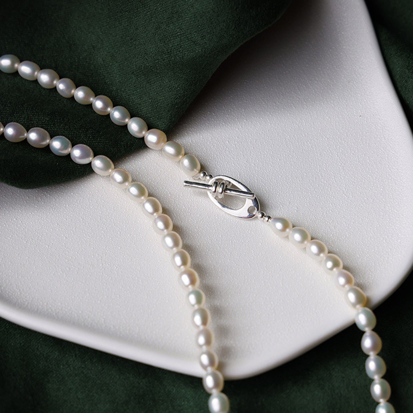 XL003 - Kisspearl Jewelry 4-5mm Rice Pearl Necklace
