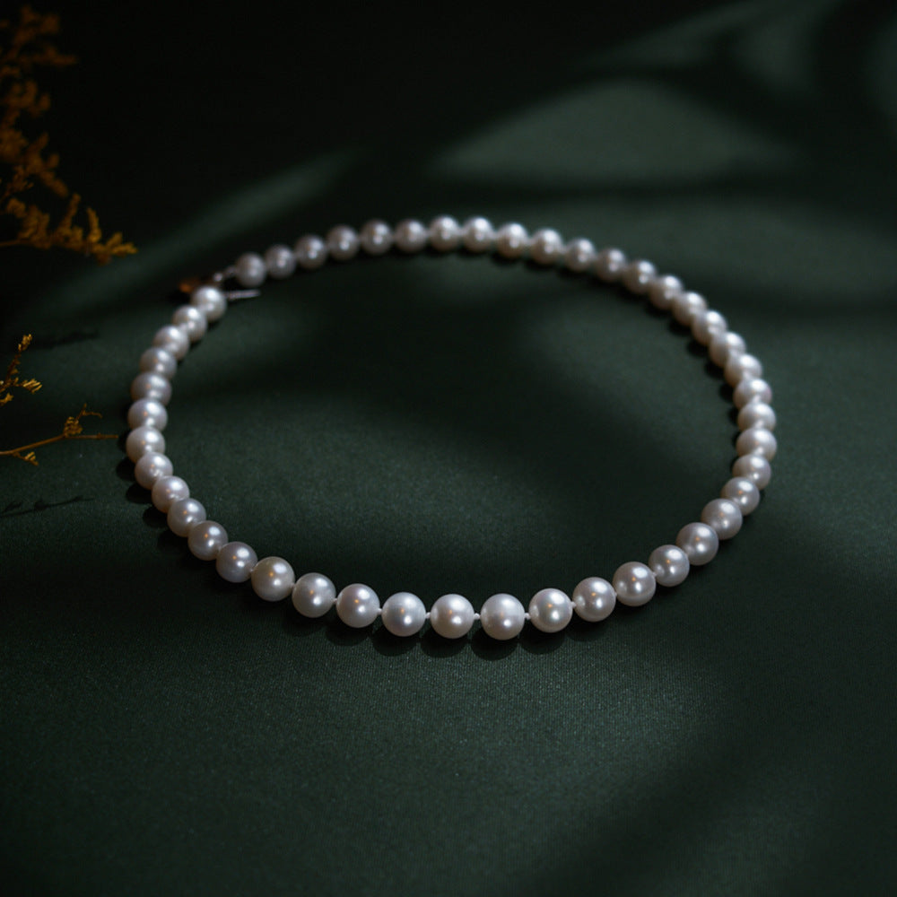 XL002 - Kisspearl Jewelry 9-10mm Near Round Pearl Necklace
