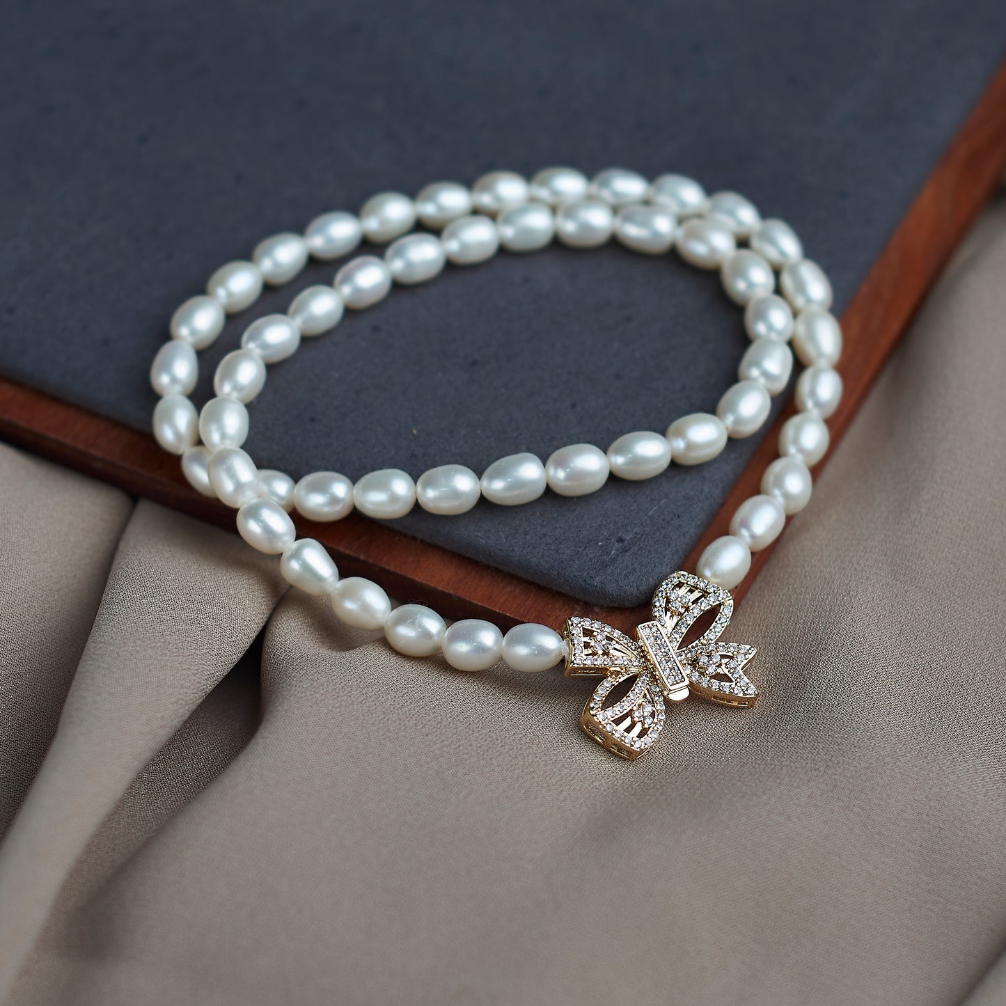 L310001 - Kisspearl Jewelry 6-7mm Rice Pearl Necklace