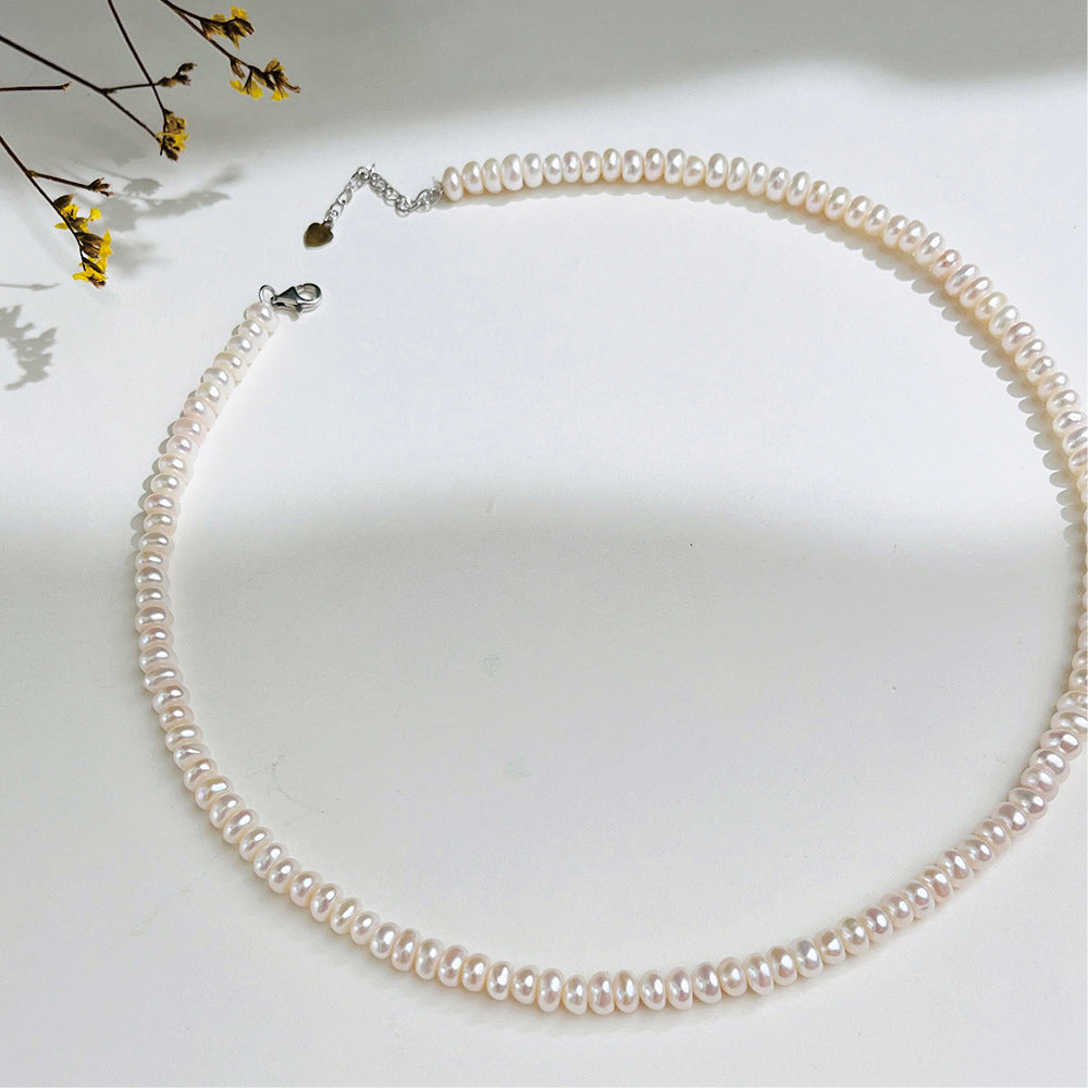 XL001 - Kisspearl Jewelry 4-5mm Button Pearl Necklace