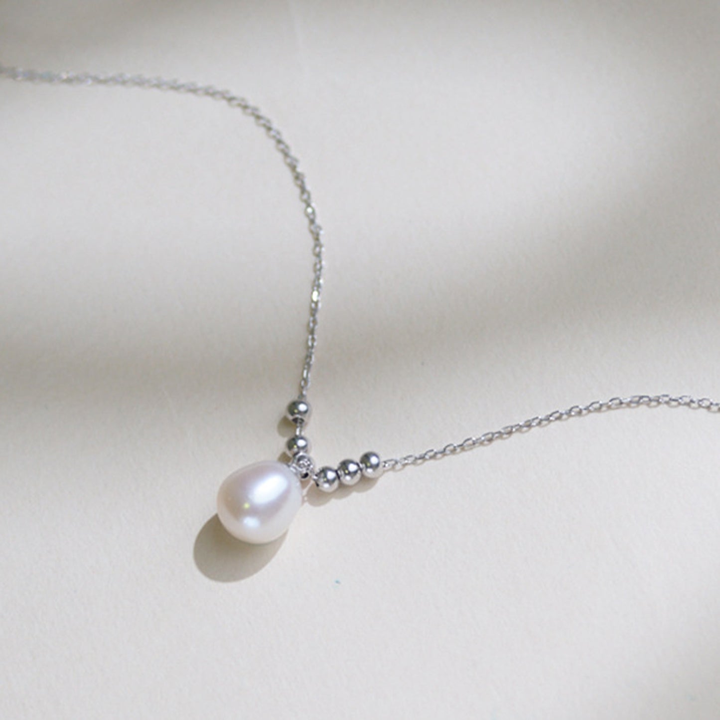 DZ001 - Kisspearl Jewelry 9-10mm Rice Pearl Pendant Necklace