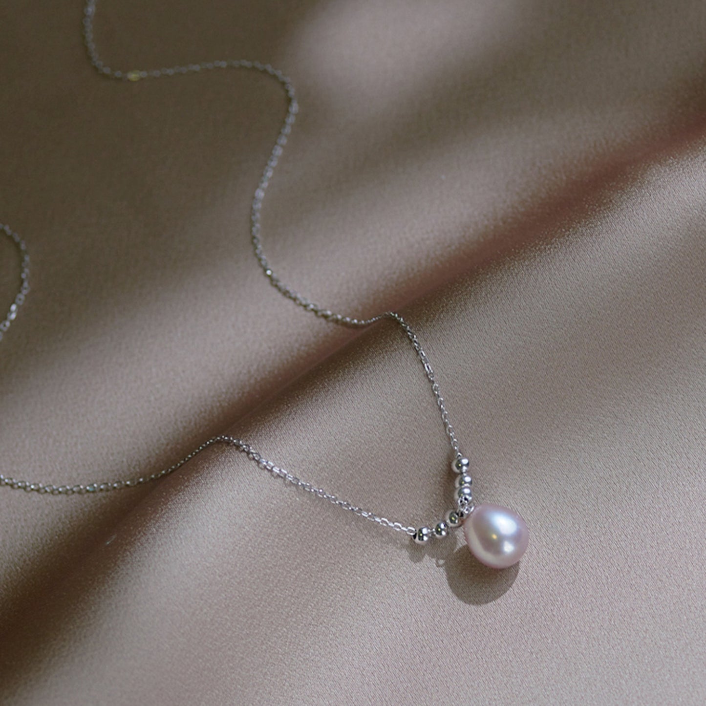 DZ001 - Kisspearl Jewelry 9-10mm Rice Pearl Pendant Necklace