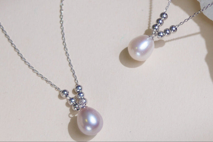 DZ001 - Kisspearl Jewelry 9-10mm Rice Pearl Pendant Necklace
