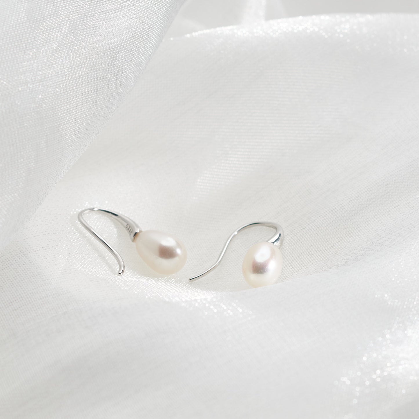 E412001 - Kisspearl Jewelry 7x10mm Rice Pearl Silver Earrings