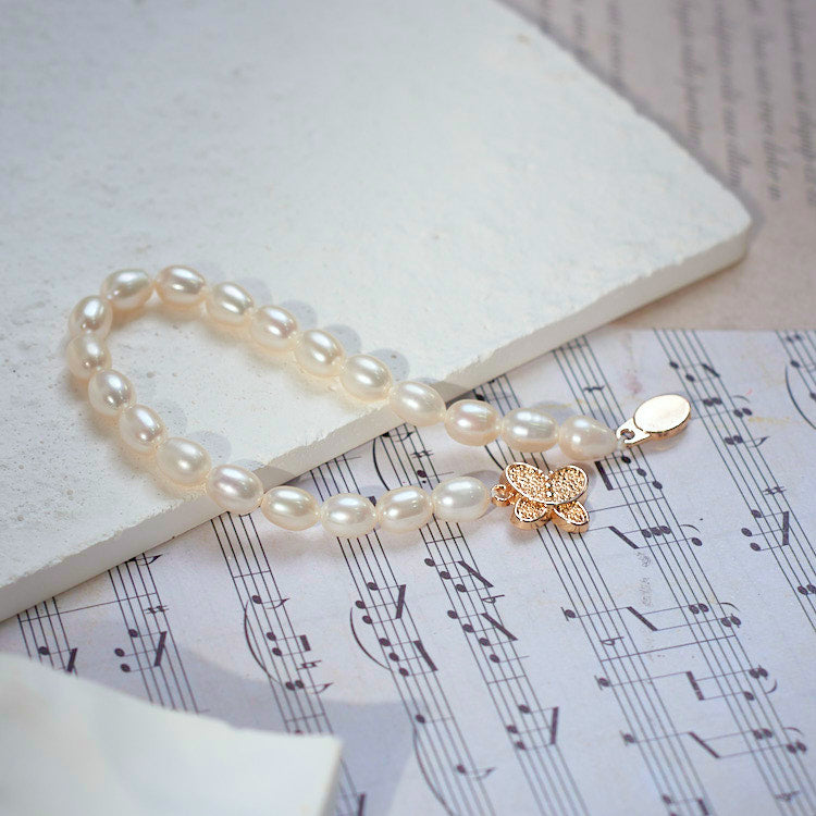S31014 - Kisspearl Jewelry 6-7mm Butterfly Rice Pearl Bracelet